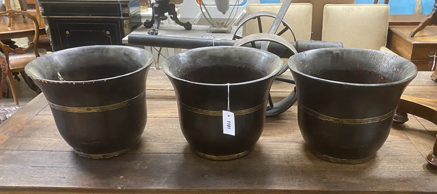 A set of three brass bound staved wood buckets, diameter 36cm, height 29cm